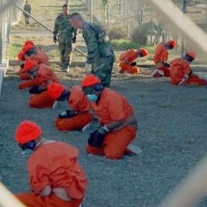 Guantanamo prisoners at recess.